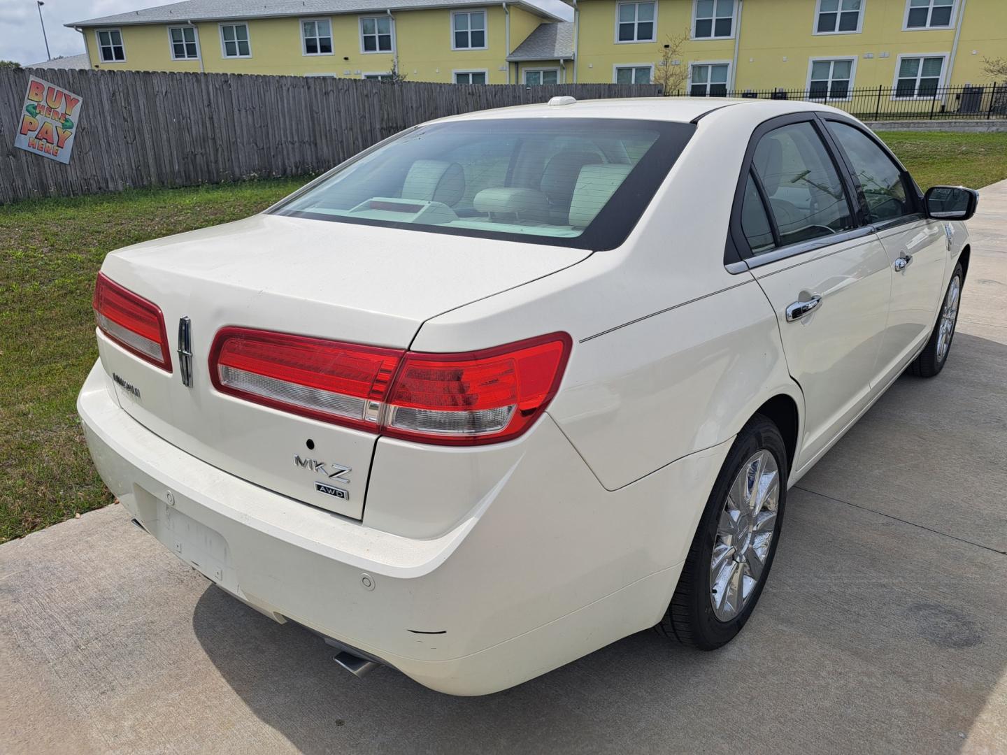 2012 White Lincoln MKZ AWD (3LNHL2JC5CR) with an 3.5L V6 DOHC 24V engine, 6-Speed Automatic transmission, located at 1181 Aurora Rd, Melbourne, FL, 32935, (321) 241-1100, 28.132914, -80.639175 - Photo#2